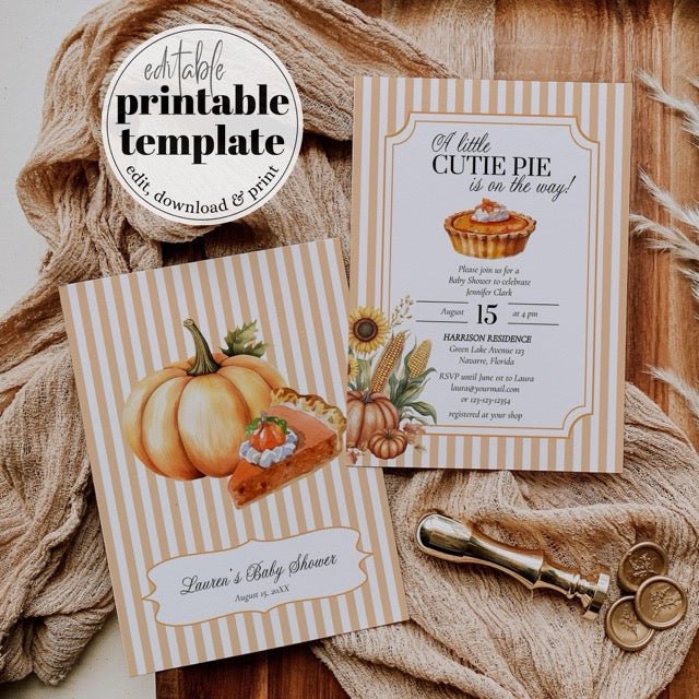 Baby shower invitations with pumpkin and pie design on a textured fabric background.