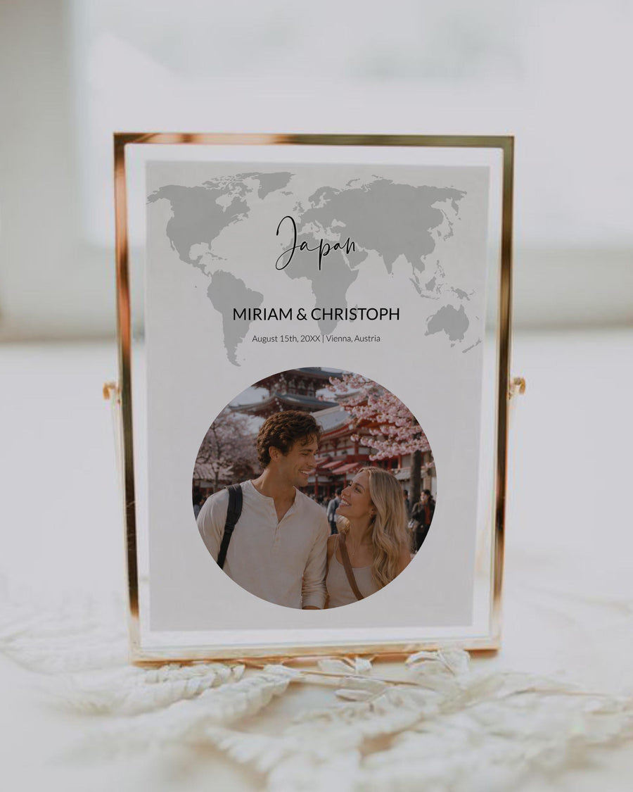 Editable travel wedding photo table number featuring a world map, destination name and replaceable couple picture in a modern minimalist reception design.
